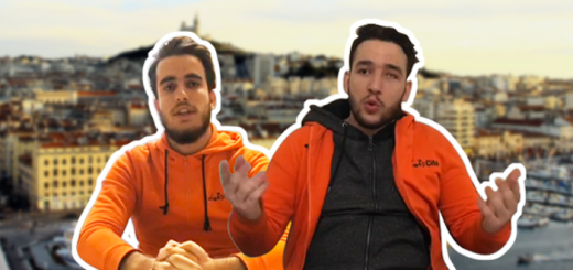 2 jeunes volontaires d'Unis Cité Marseille portant le pull orange de l'association